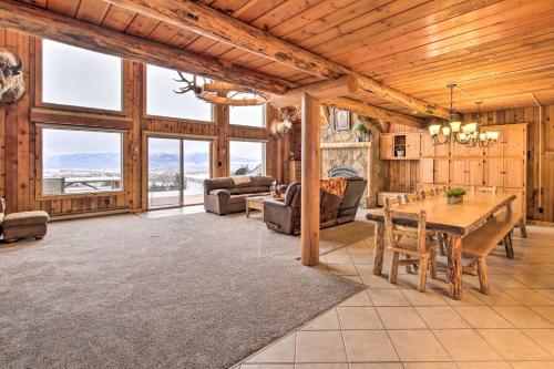 a large living room with a table and chairs at A-Frame Home with Breathtaking Views and Hot Tub! in Bozeman