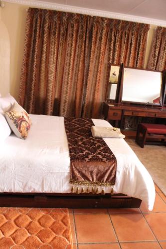 Katil atau katil-katil dalam bilik di Beit-El BnB
