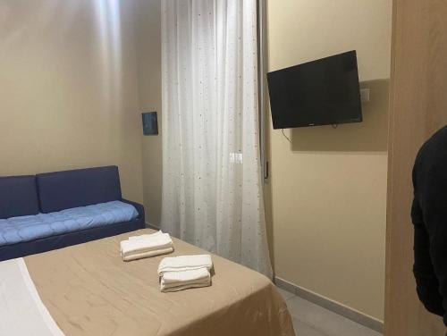 Televisyen dan/atau pusat hiburan di B&B Villa Filù