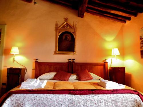 Tempat tidur dalam kamar di Azienda Agricola Fabbrica Di San Martino
