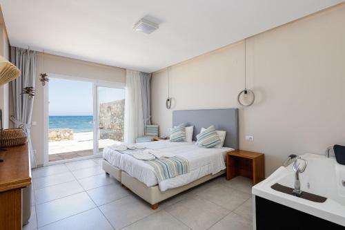 Posteľ alebo postele v izbe v ubytovaní Theo Star Beach Hotel