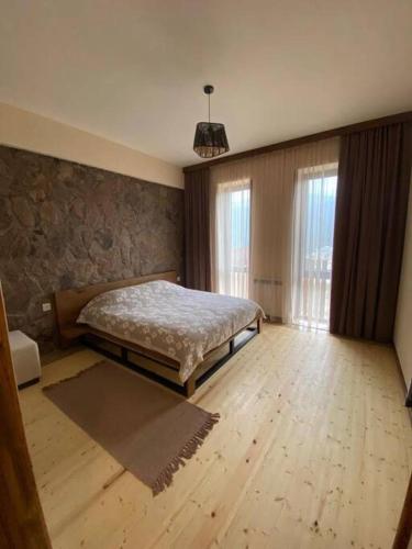 Llit o llits en una habitació de DN House Dilijan