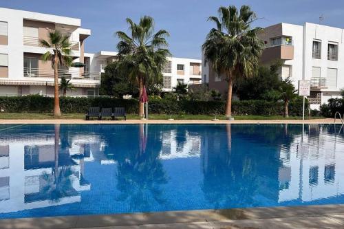 Πισίνα στο ή κοντά στο bel appartement avec piscine résidence taflout immioudar taghazout agadir