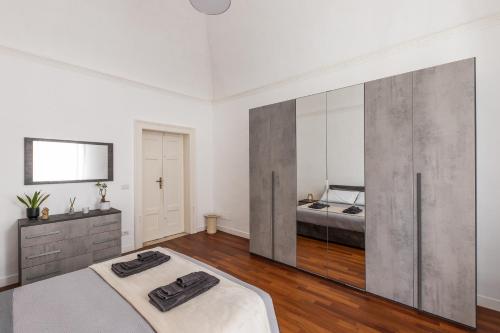 Postel nebo postele na pokoji v ubytování Casa dei Visionari