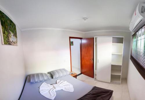 Postel nebo postele na pokoji v ubytování Apto com Wi-Fi em Monte Castelo - Campo Grande MS