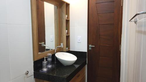 Ένα μπάνιο στο Apartamento Barreirinhas