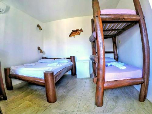 Postel nebo postele na pokoji v ubytování Morro Beach Hotel