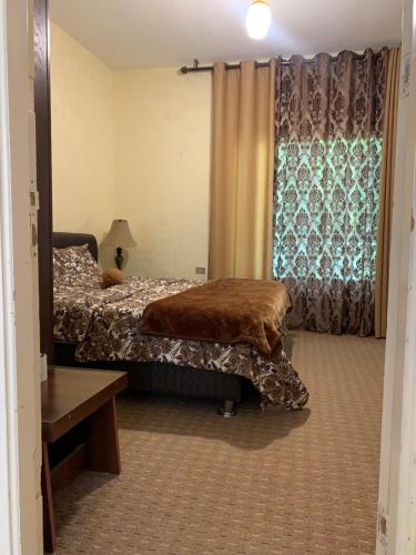 Cama o camas de una habitación en Petra Rest Home