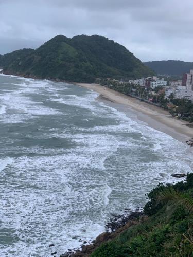 a view of the ocean with a beach at Hotel The Green Ecologic in Guarujá
