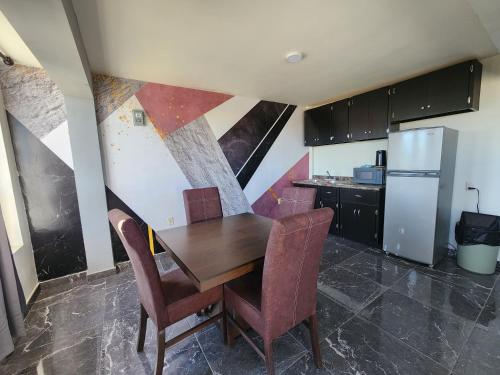Кухня или мини-кухня в Apartamentos Milenario
