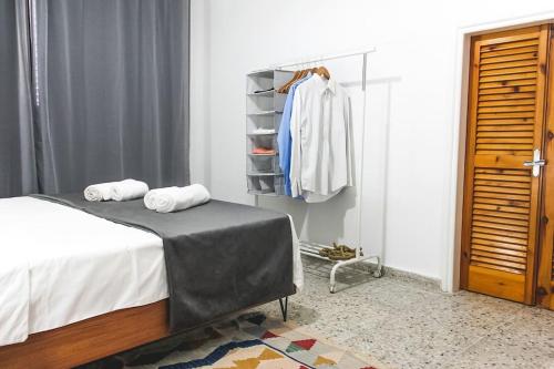 Postel nebo postele na pokoji v ubytování Blue Levant Guest House