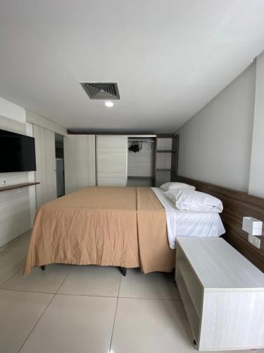 En eller flere senge i et værelse på Imperial Flat Tambau