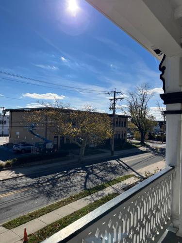 a view of a street from a balcony at Elaine's Cape May Boutique Hotel in Cape May