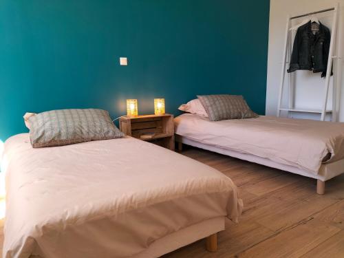 Posteľ alebo postele v izbe v ubytovaní Les prés du petit Morlu - proche Beauval