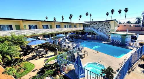 an aerial view of a hotel with a swimming pool at Quality Inn & Suites Anaheim at the Park in Anaheim
