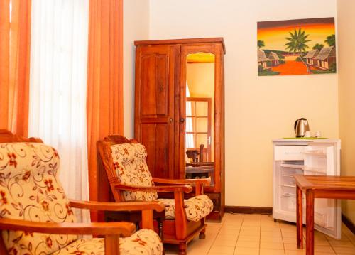 Coin salon dans l'établissement Victory Hotel & Restaurant Tulear