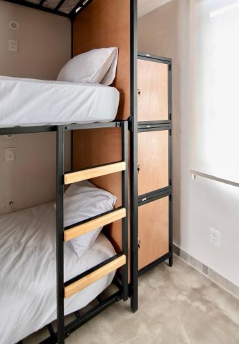 a bunk bed room with two bunk beds at Casa Irake in Guadalajara