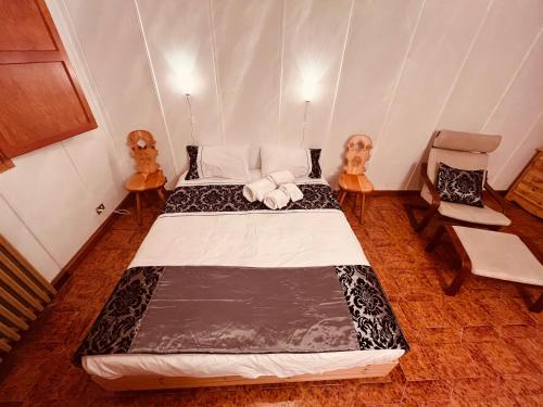 Кровать или кровати в номере La Baita Limone Riserva Bianca Ski-in Ski-out Seggiovia Morel 3