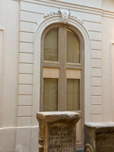 a window on the side of a building at Hotel Atia in Guadalajara