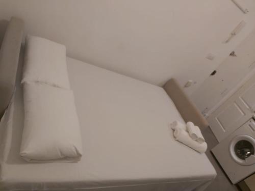Cama o camas de una habitación en Cozy Studio Reina Sofia Amparo