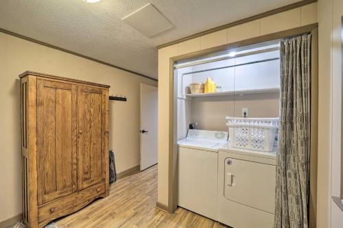 a laundry room with a washing machine and a window at Pristine Cabin Less Than 2 Mi to Beech Mountain Resort! in Beech Mountain