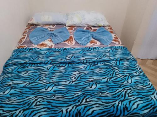 מיטה או מיטות בחדר ב-Hostel Morais Praia