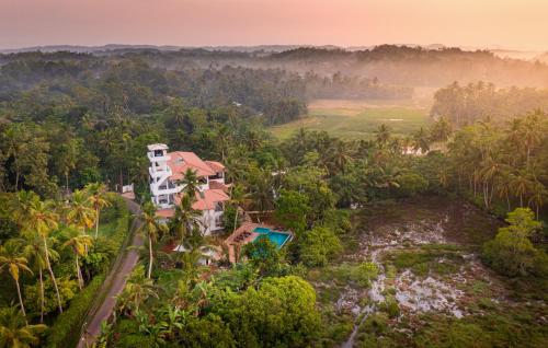 an aerial view of a resort in the jungle at Serenity Boutique - Unawatuna in Unawatuna