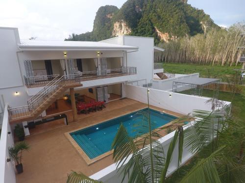 an aerial view of a house with a swimming pool at 8 Palm Villa - Private Pool Villas in Aonang in Ao Nang Beach