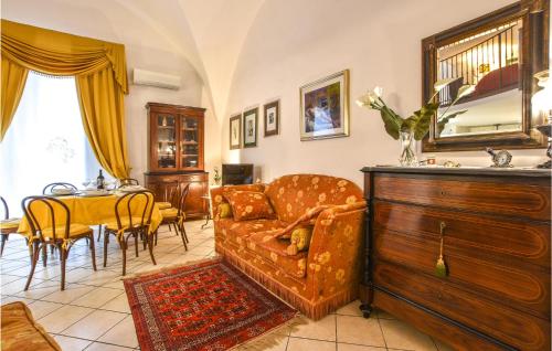 a living room with a couch and a table at Sicily Love Loft in Catania