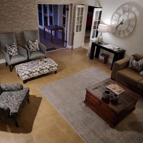Ruang duduk di Plumwood Boutique Hotel by The Living Journey Collection