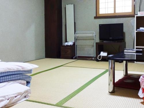 Televízia a/alebo spoločenská miestnosť v ubytovaní Imazato Ryokan - Vacation STAY 02530v