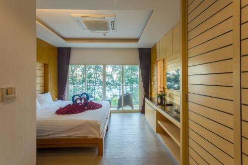 Postel nebo postele na pokoji v ubytování Anda Beachside Hotel