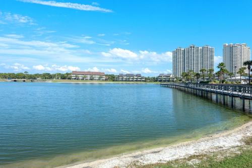 a large body of water with buildings in the background at Ariel Dunes II 101 in Destin