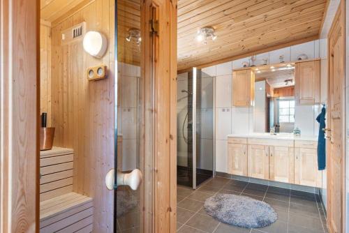 a bathroom with a shower and a sink at Trysilfjellet in Trysil