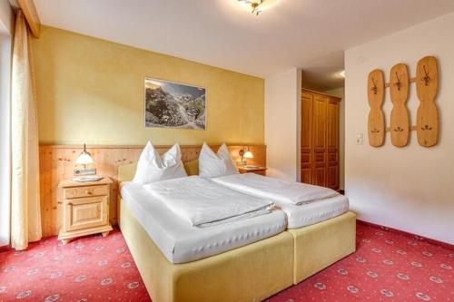 Posteľ alebo postele v izbe v ubytovaní Holiday flat with wellness area at the Fügenerhof