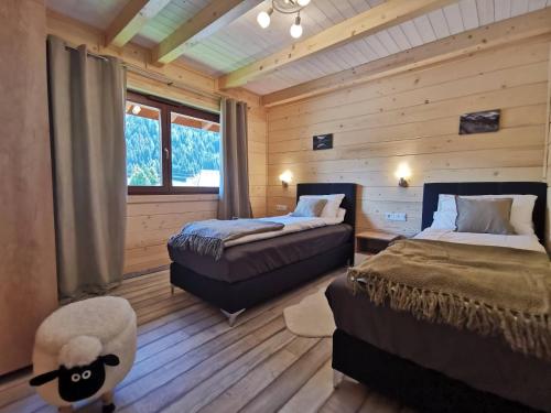 Ein Bett oder Betten in einem Zimmer der Unterkunft Tauern Appartements
