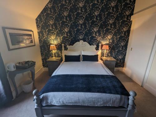 Ένα ή περισσότερα κρεβάτια σε δωμάτιο στο Reiver House Bed & Breakfast