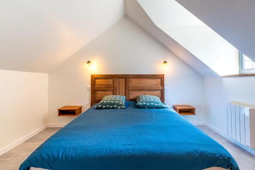 Una cama o camas en una habitación de Gîte de la Porte des Moines