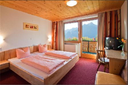 Postelja oz. postelje v sobi nastanitve Hotel Burtschahof