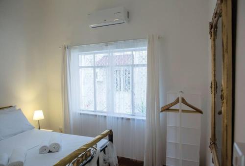 Postel nebo postele na pokoji v ubytování Templar Guesthouse