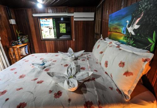 Postel nebo postele na pokoji v ubytování Pousada e Restaurante Amazonia