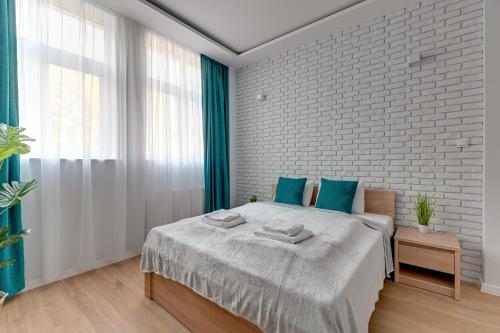 Posteľ alebo postele v izbe v ubytovaní Comfort Apartments Grobla II