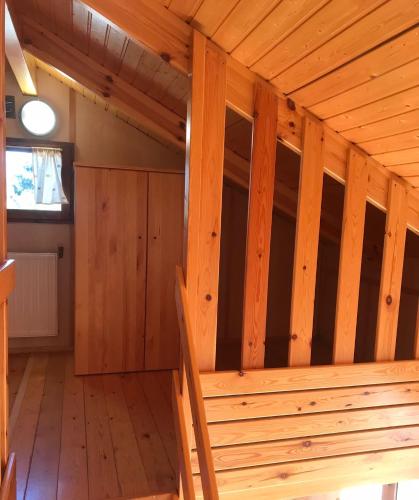 a large wooden room with a sauna at Camping Gran Sol in Montferrer