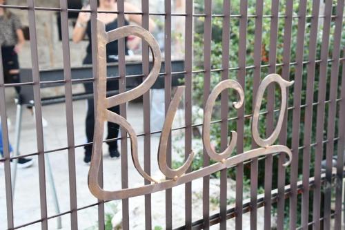 a metal fence with the word order written on it at Villa Rico Masseria nel Parco in Caramanico Terme