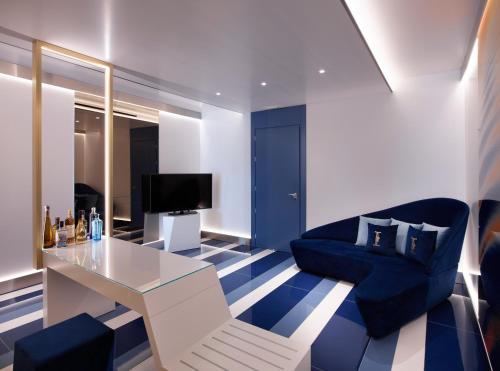 TV a/nebo společenská místnost v ubytování I Resort Beach Hotel & Spa