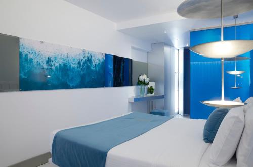 Postel nebo postele na pokoji v ubytování I Resort Beach Hotel & Spa