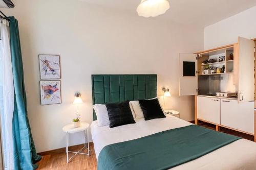 Posteľ alebo postele v izbe v ubytovaní Studio Flat - Piazza San Cosimato By YourHost