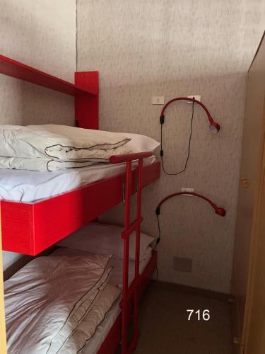 Postel nebo postele na pokoji v ubytování House Cervinia Apartments