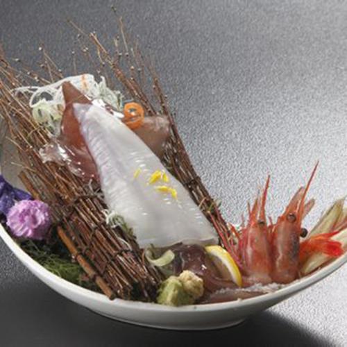 a bowl of food with seafood and vegetables on it at Kyukamura Oku-Daisen in Daisen