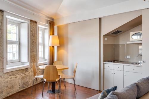 Kuchyň nebo kuchyňský kout v ubytování Traça Apartments by DA'HOME